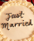 Black Bows Just Married Wedding Cake