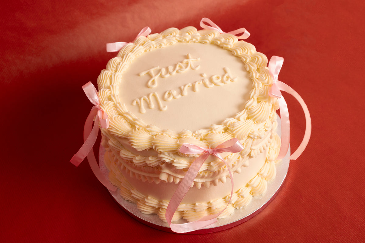 Pink Bows Just Married Cake